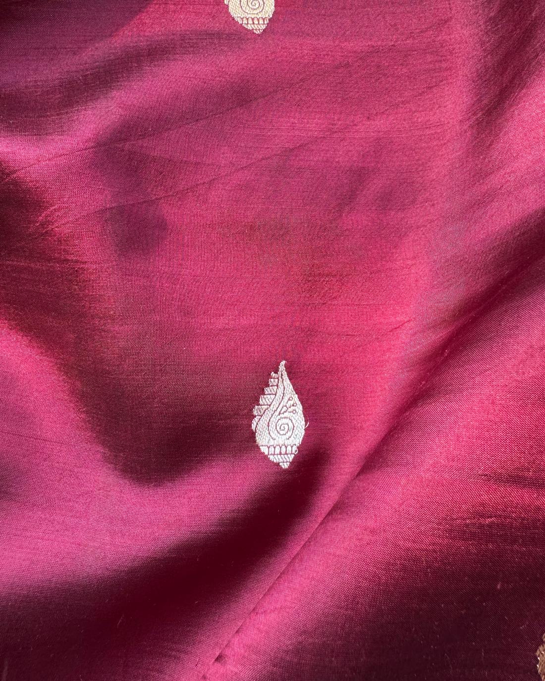 Wine pure Mulberry soft silk Banarasi saree folded showing pallu and body