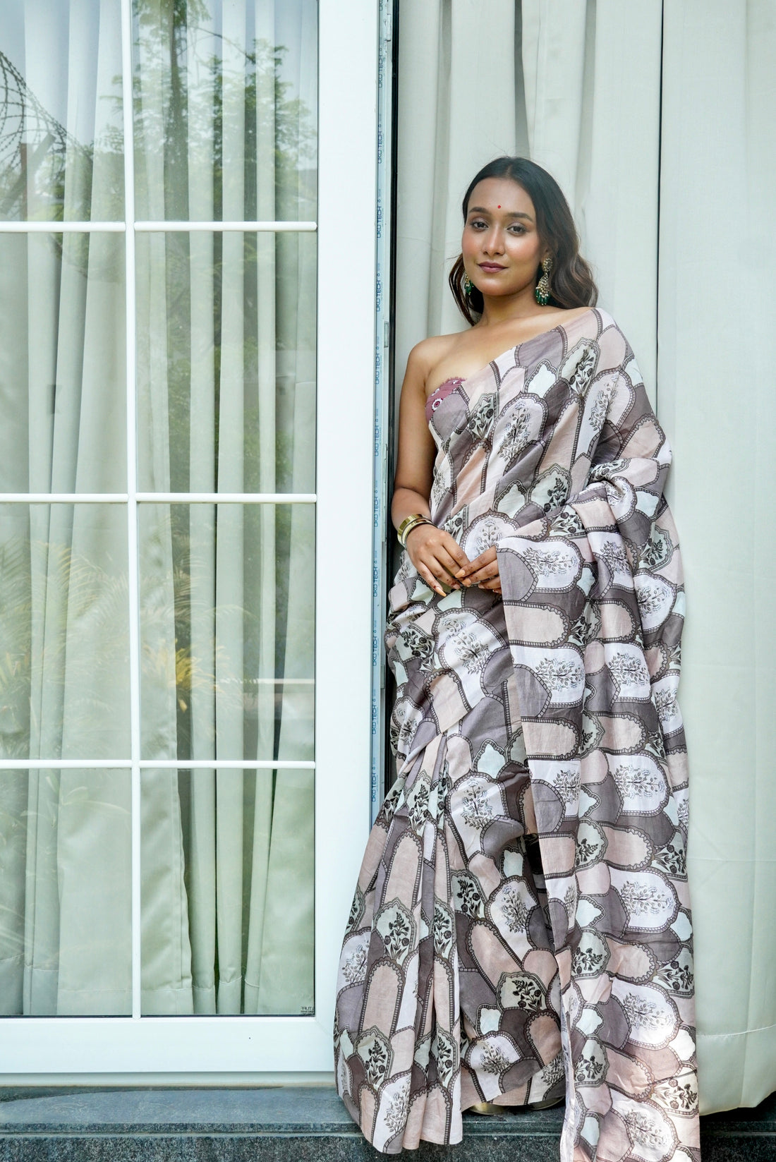 Peach-pink pure silk saree with digital print design folded view