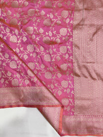 Richly woven geometric zari pallu on rani pink Pick & Pick Banarasi saree