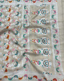 Handwoven silver zari pallu on ash white tissue Georgette saree