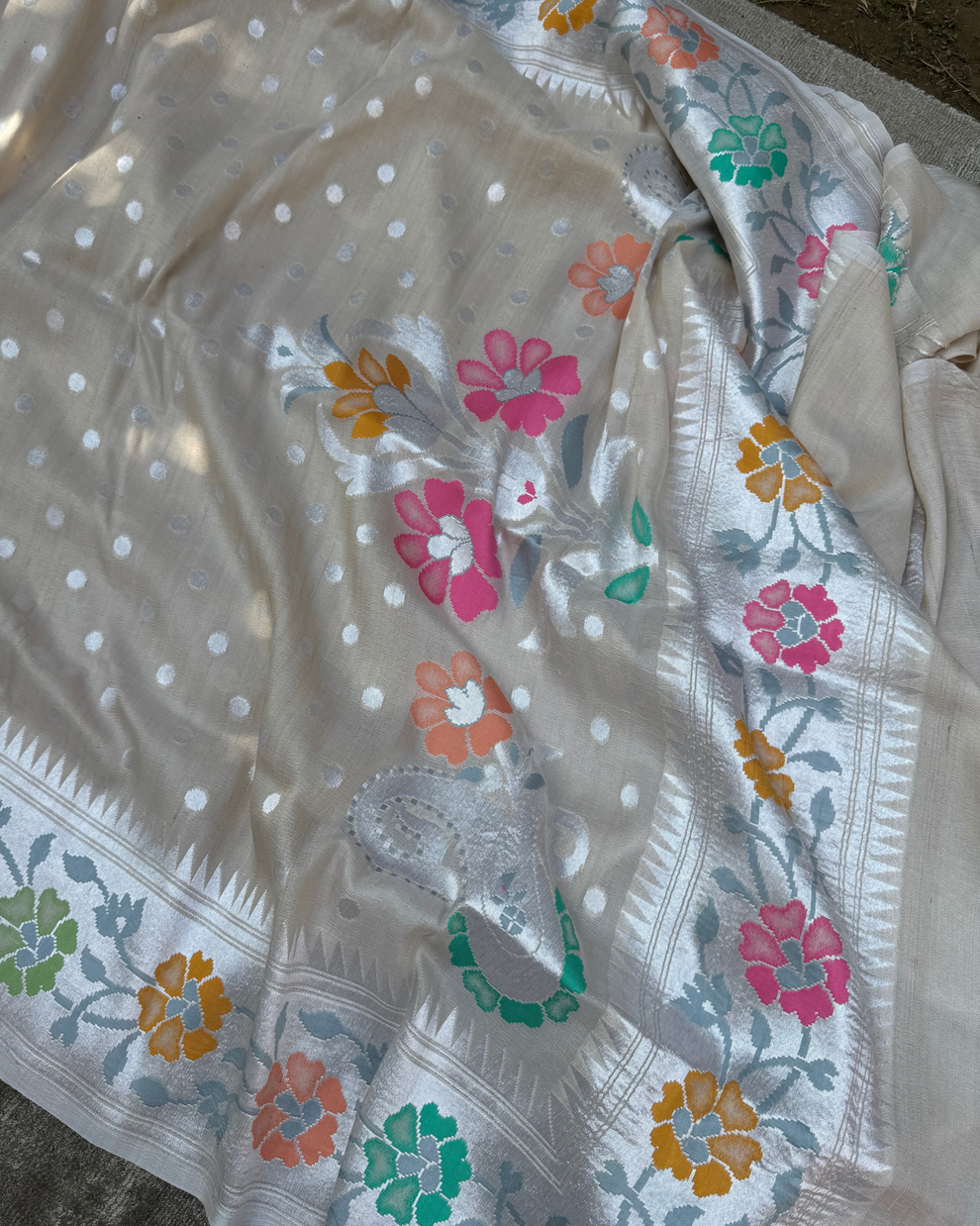 Ash white pure Tussar Georgette Banarasi saree with delicate zari work