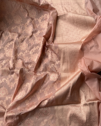 Handwoven Kadhua floral motif detail on dusty peach pure Katan silk saree