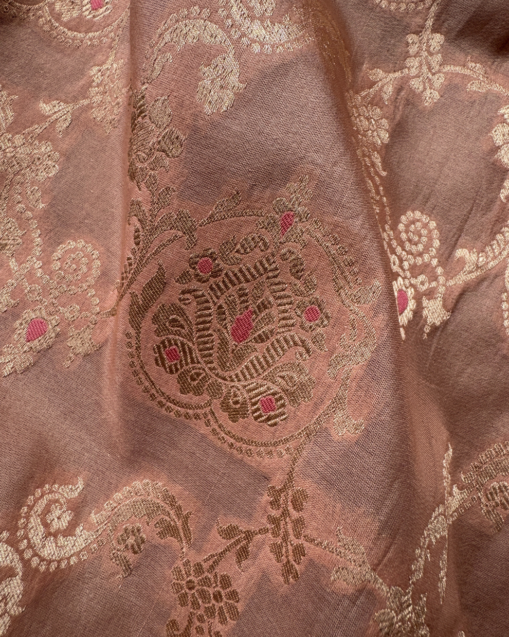 Artisan handloom craftsmanship of dusty peach Banarasi pure Katan saree