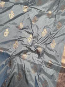 Richly woven traditional Banarasi pallu on powder blue Katan saree