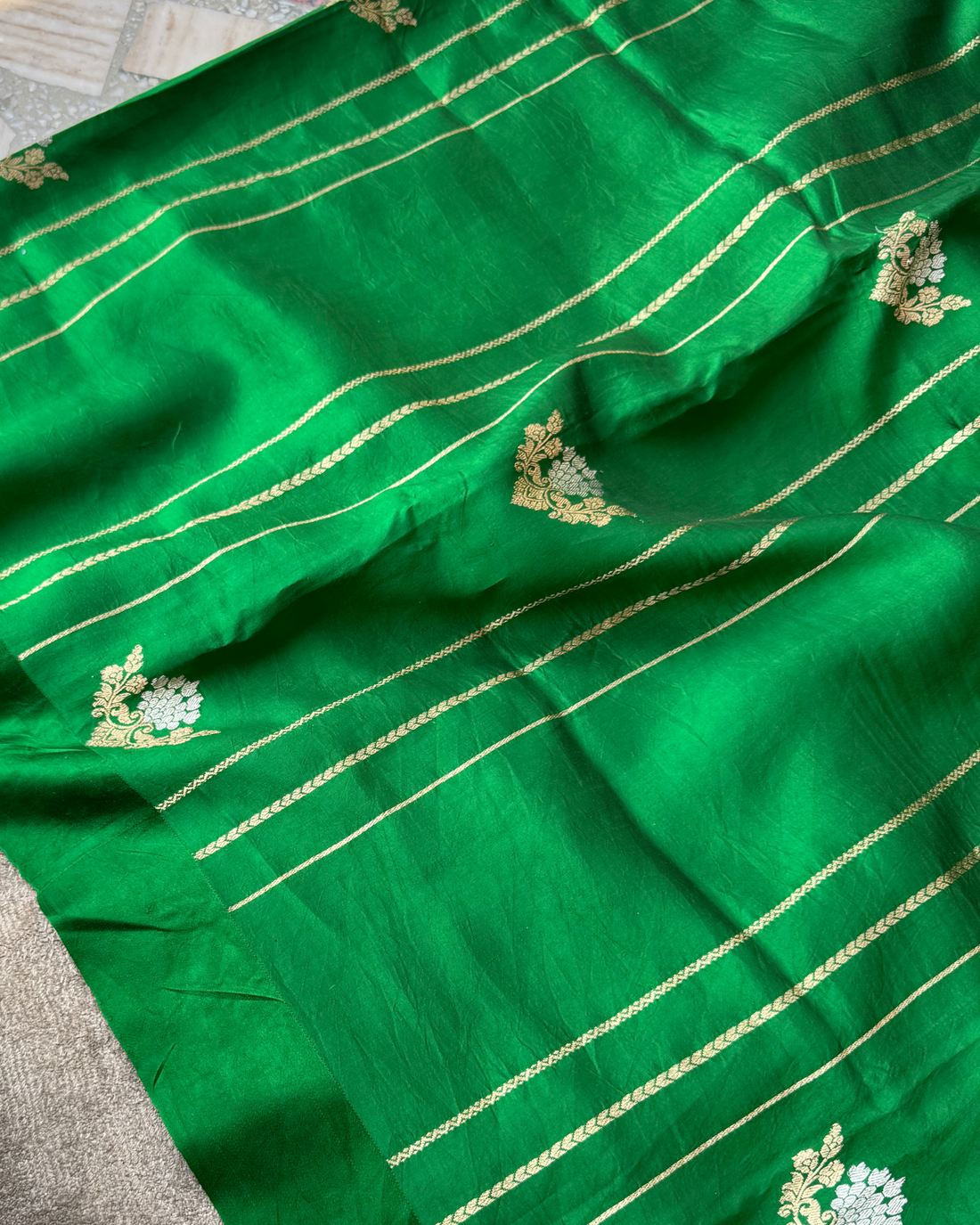 Close-up of lustrous weave on green Mulberry soft silk saree