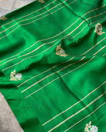 Close-up of lustrous weave on green Mulberry soft silk saree
