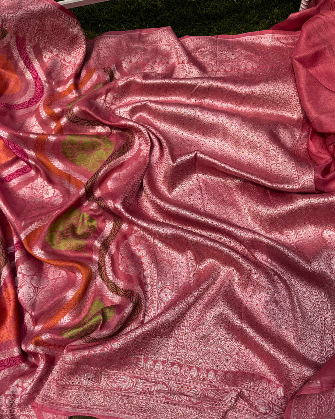 Silver zari border and pallu design of dusty pink pure Tussar Georgette saree