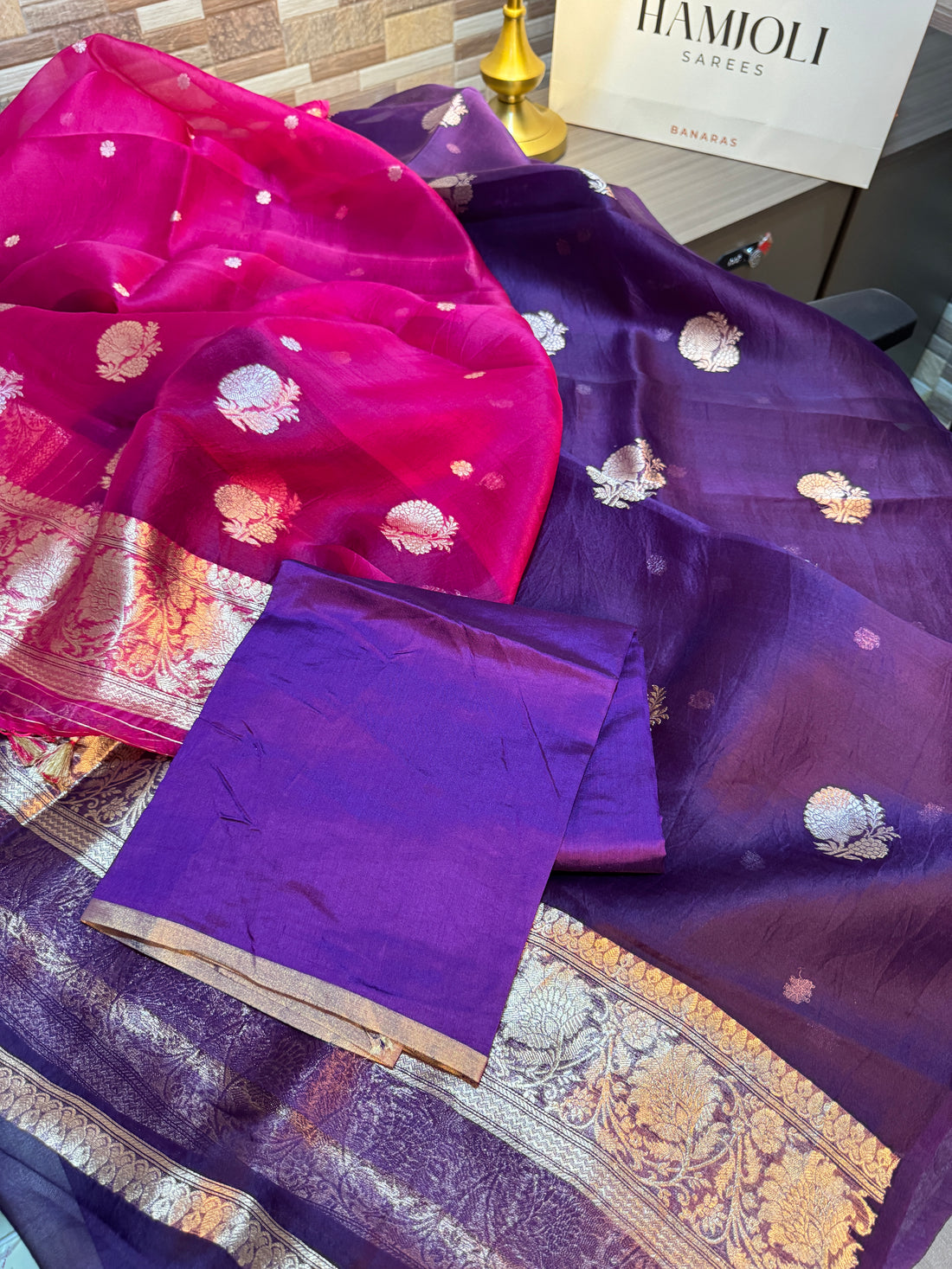 Close-up of handwoven Kadwa sona rupa zari buttas on Jamuni purple Kora silk kurta