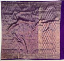 Traditional Banarasi zari border on purple pure Katan silk saree close-up