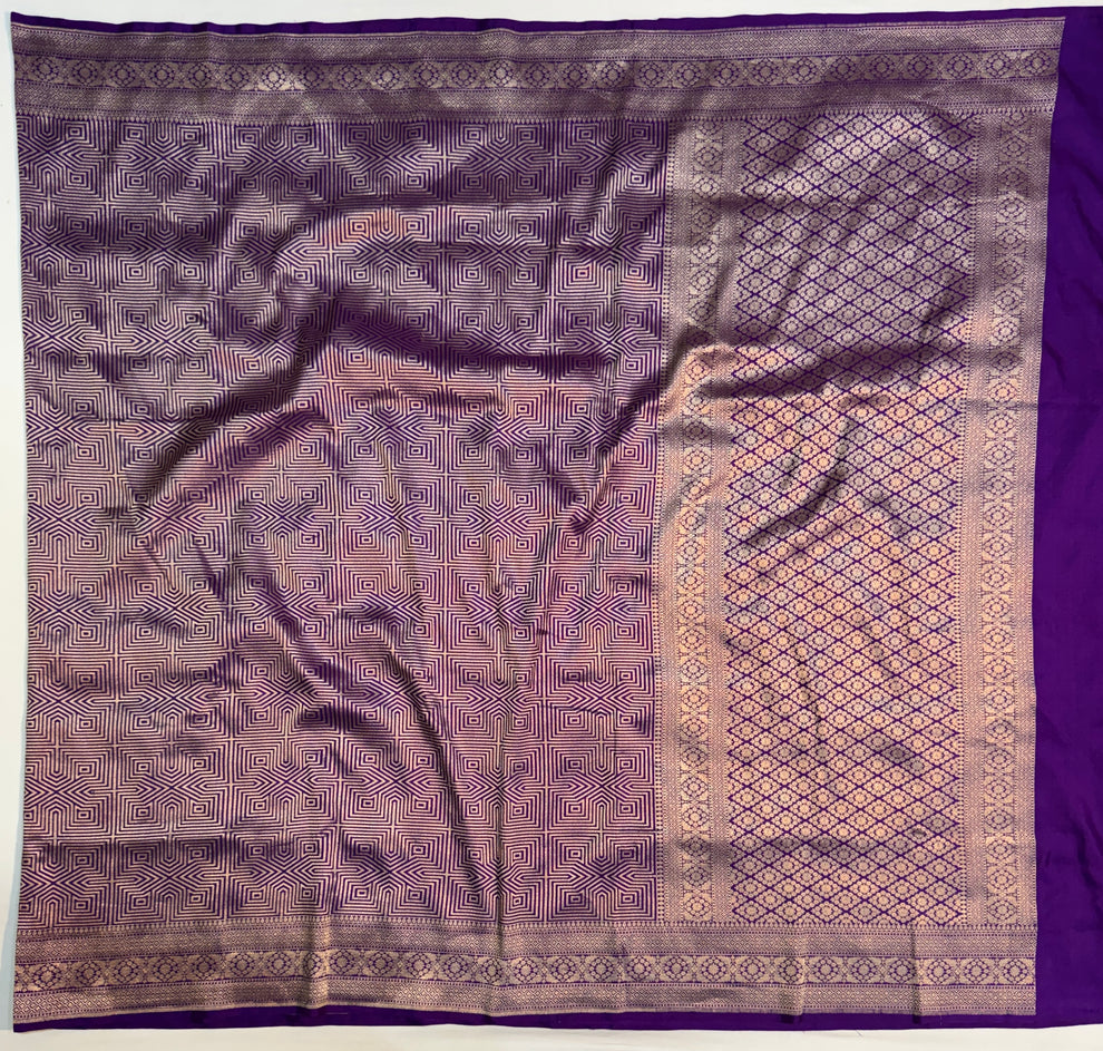 Traditional Banarasi zari border on purple pure Katan silk saree close-up