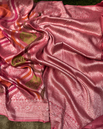 Artisan handloom craftsmanship on dusty pink pure Tussar Georgette saree
