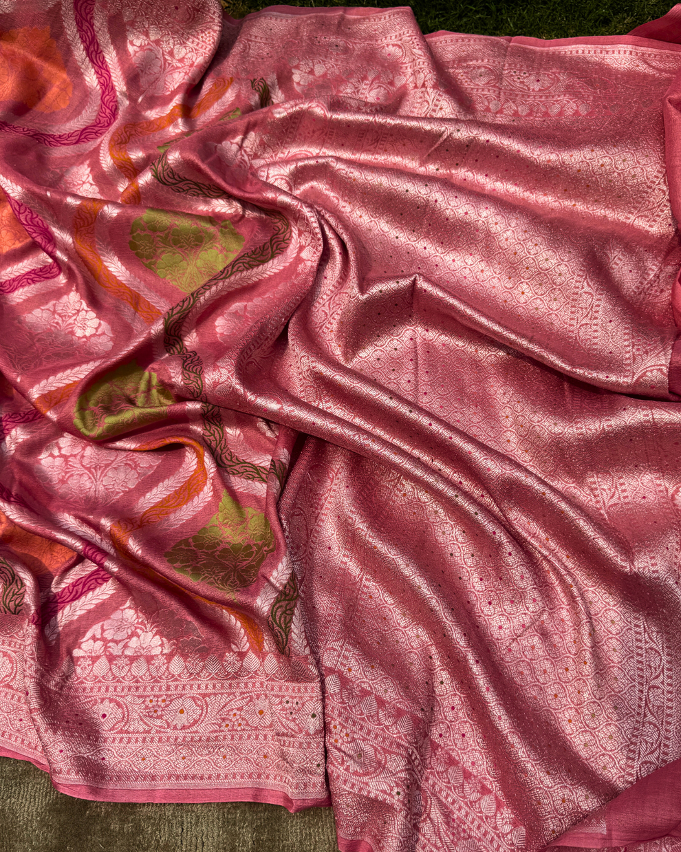 Artisan handloom craftsmanship on dusty pink pure Tussar Georgette saree