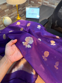 Floral zari bootas on purple pure Kora silk kurta fabric close-up