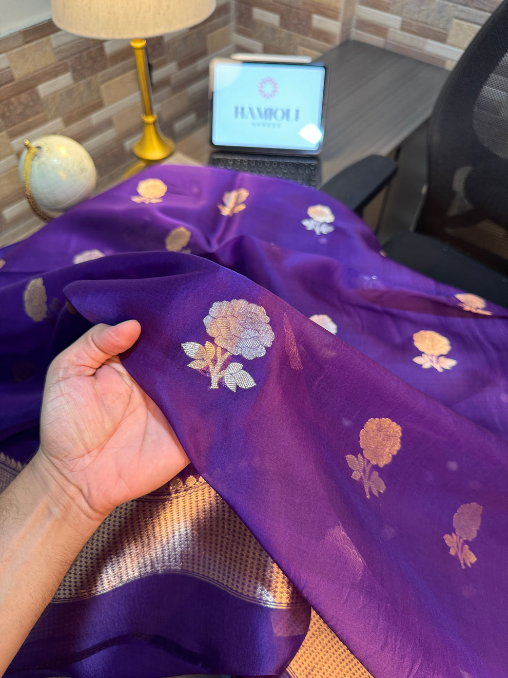 Floral zari bootas on purple pure Kora silk kurta fabric close-up
