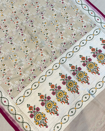 Close-up of resham and silver Meenakari work on ivory saree