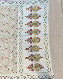 Intricate Meenakari pallu on soft ivory handloom Georgette saree
