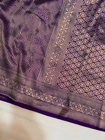 Rich geometric zari woven pallu on purple pure Katan silk Banarasi saree