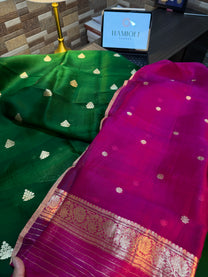 Woven floral motifs on rich green Kora silk kurta fabric close-up