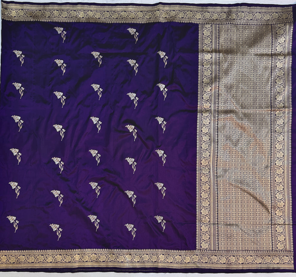 Traditional Banarasi gold zari border on royal purple silk saree