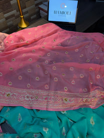 Folded view of Gulnaar and Firoza georgette unstitched suit set ensemble
