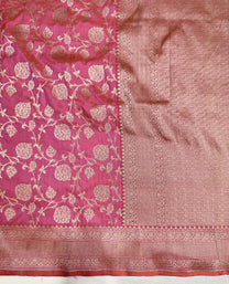 Radiant festive drape of rani pink pure Katan silk jaal saree from Varanasi