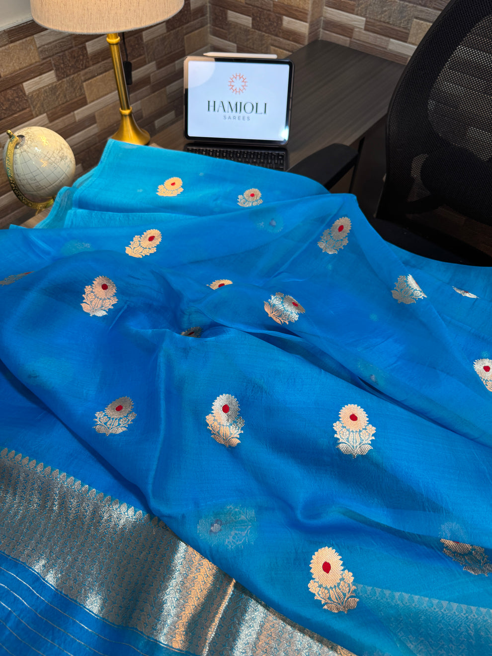 Electric cyan Kora silk suit set fabrics arranged in folded flat lay