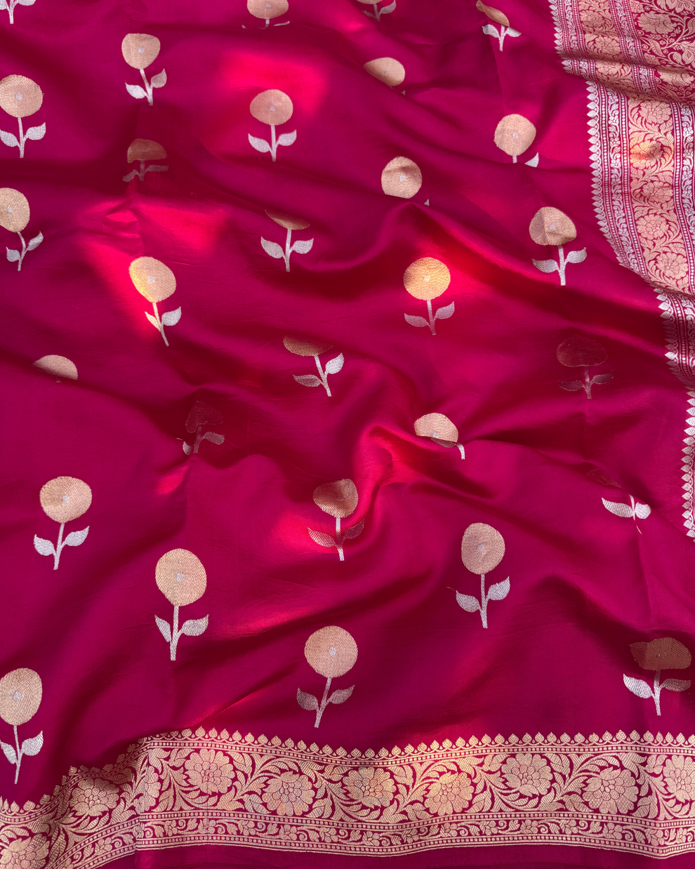 Dark pink pure Mulberry soft silk Banarasi saree with zari floral motifs drape