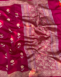 Pallu view of dark pink pure Mulberry soft silk saree with zari detailing