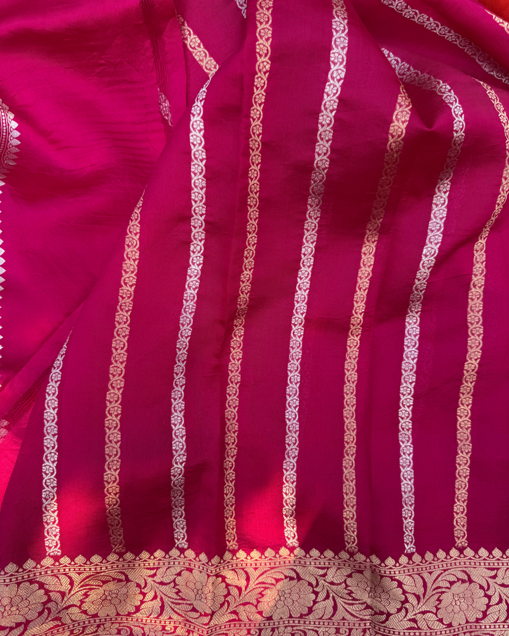 Elegant floral zari border on dark pink pure Mulberry soft silk saree