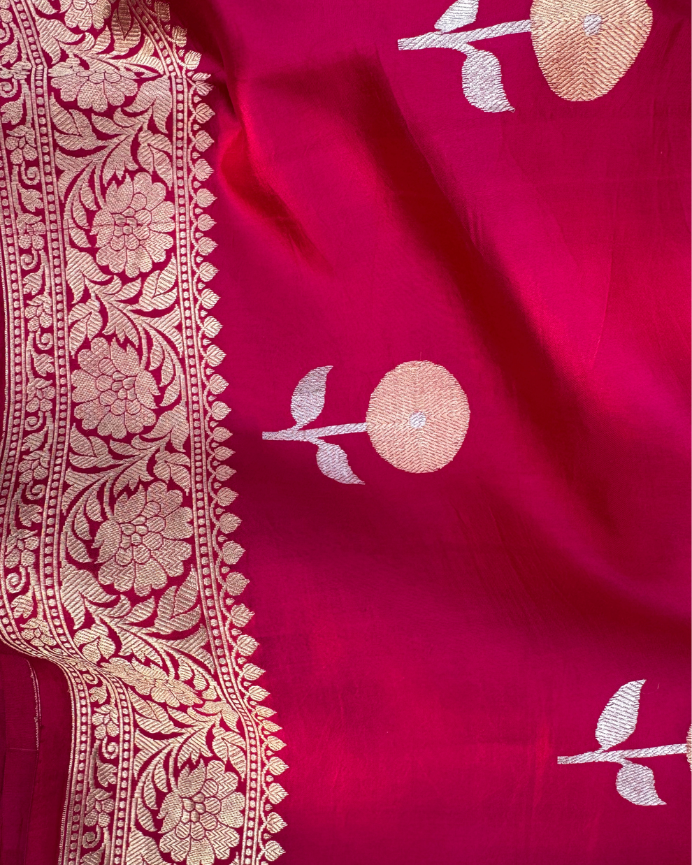 Lustrous texture and weave of dark pink pure Mulberry soft silk saree
