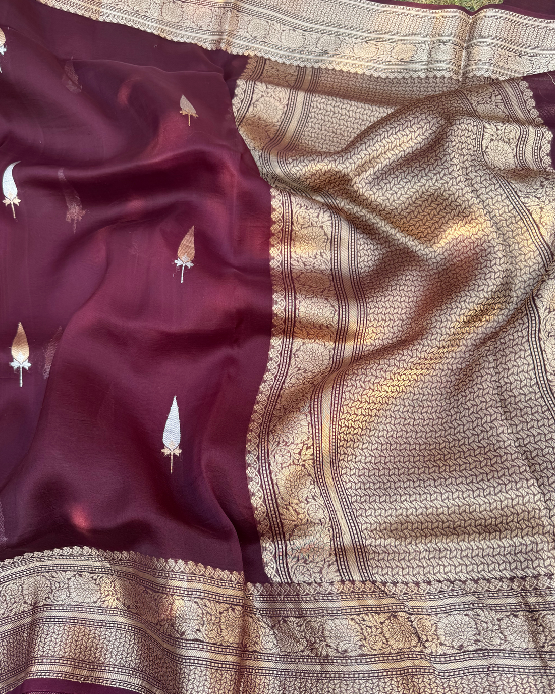 Zari border and pallu detail of magenta pink pure Kora silk Banarasi saree