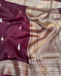 Zari border and pallu detail of magenta pink pure Kora silk Banarasi saree