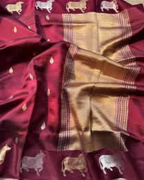 Delicate Shankh bootas on wine pure Mulberry soft silk saree close-up