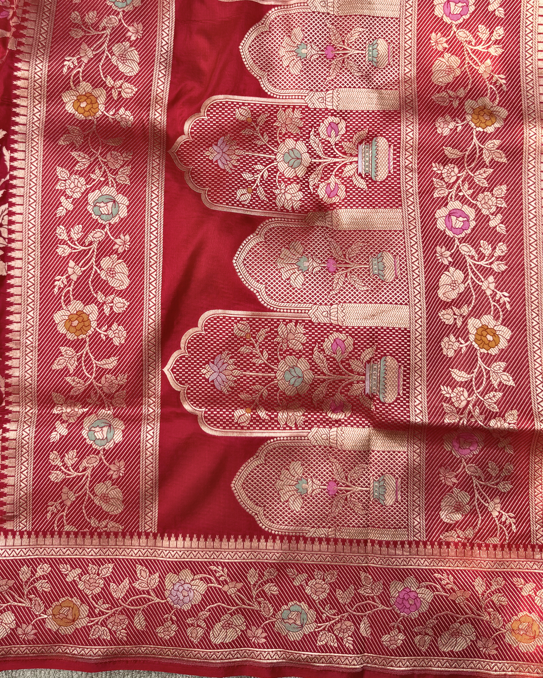 Magnificent handwoven pallu on red pure Katan silk Jangla saree