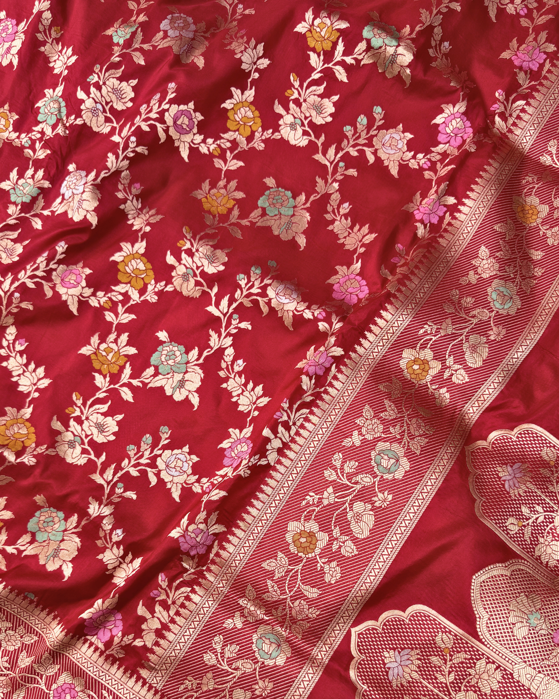 Heirloom bridal drape of red handloom Banarasi silk saree from Varanasi