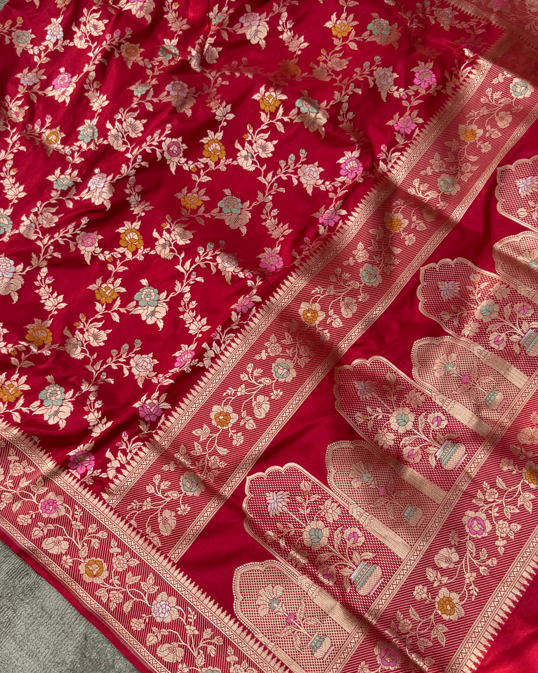 Artisanal handwork crafted over 250 hours on red pure Katan silk Jangla saree