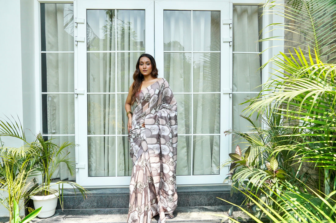 Intricate digital print patterns on lightweight peach-pink pure silk fabric