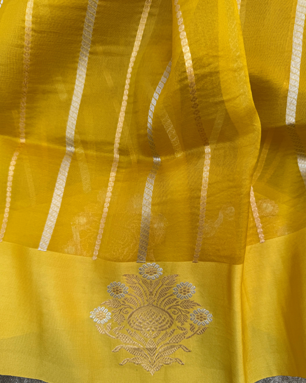 Traditional Banarasi yellow Kora silk saree crafted over 35 to 40 days