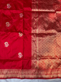 Artisanal handwoven border on red pure Katan silk heirloom Banarasi saree