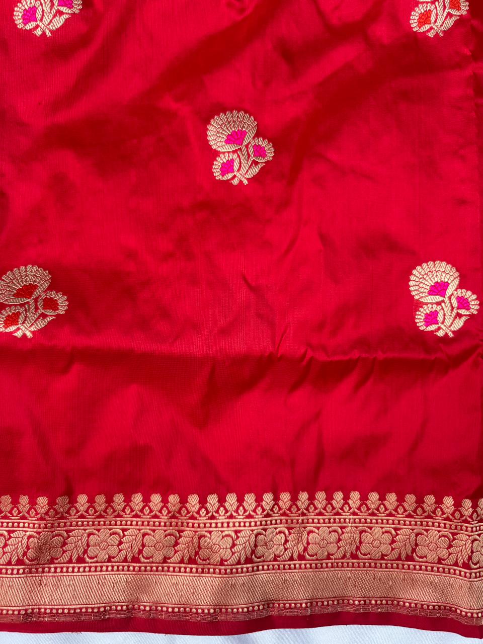Draped look of royal deep red Banarasi Katan silk saree for weddings