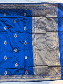 Intricate Kadwa Meenakari boota motifs on blue pure Katan silk saree