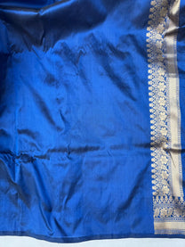 Handwoven blue lotus inspired border with fine zari detailing