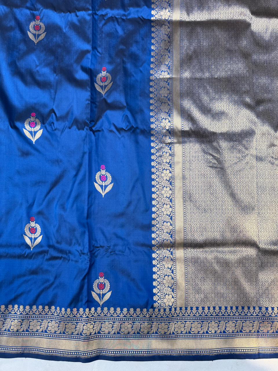 Close-up of authentic Meenakari craftsmanship on pure Katan handloom silk