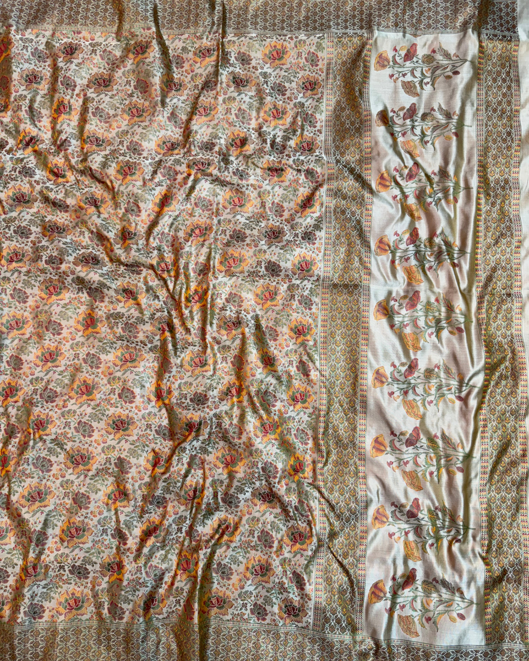 Yellow gold pure silk Banarasi saree pallu with royal heritage design