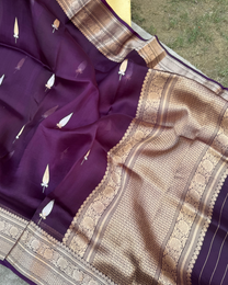 Fine Kadwa weave craftsmanship on purple pure silk saree created over 35 days