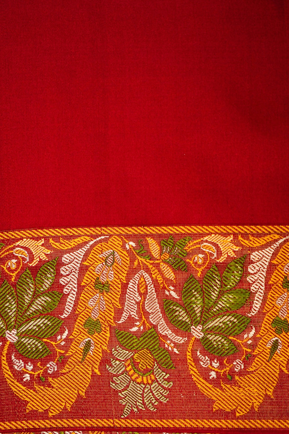 Draped look of royal red Mashru silk saree handcrafted in Varanasi