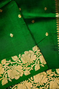 Floral-patterned woven border and pallu of green pure Mulberry Katan saree