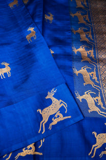 Zari border and deer motif detailing on blue pure Mulberry Katan silk saree