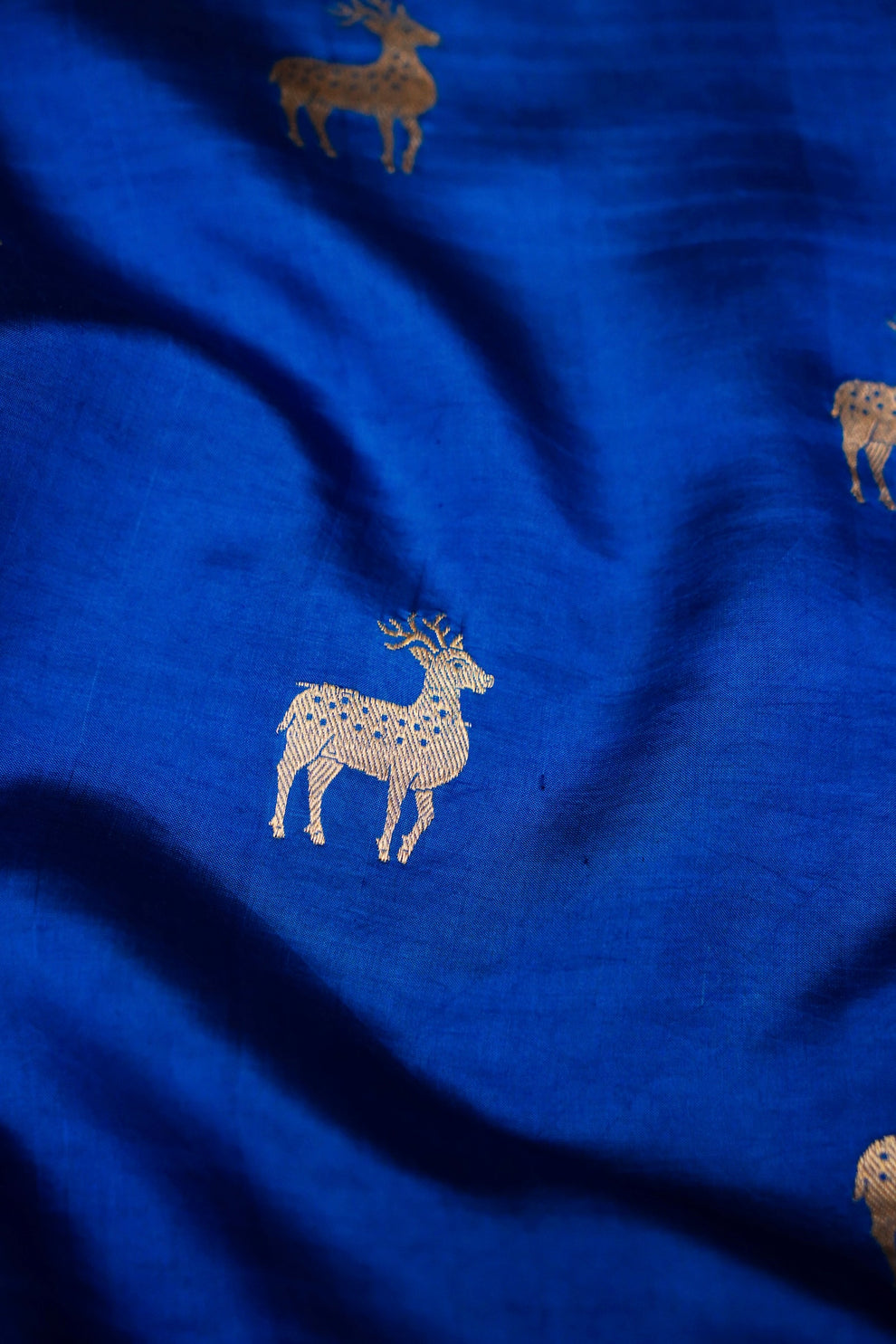 Intricate handwoven Kadhua pallu on blue pure Mulberry Katan silk saree