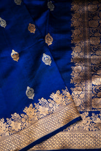 Bold floral border handloom detailing on royal blue Mulberry Katan saree